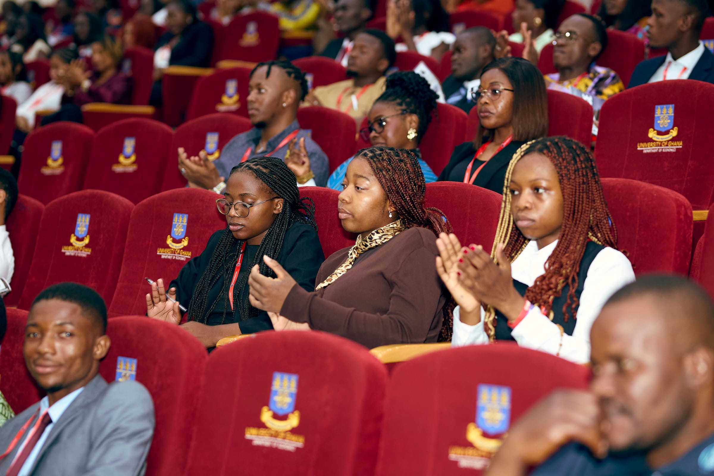 YMAU V delegates applauding together during the plenary programme